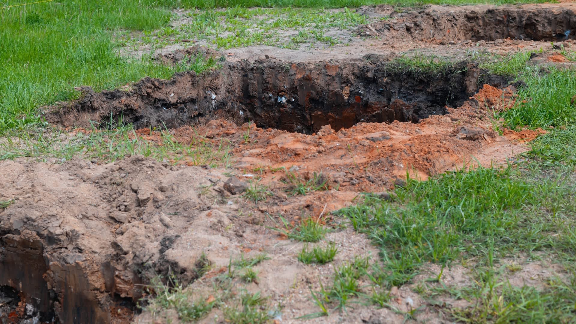Tennessee backyard sinkholes raise alarm after resident says ground collapsed under husband