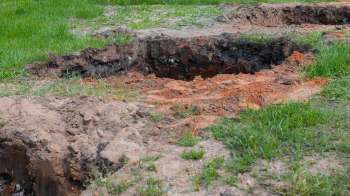 Sinkholes in a backyard.