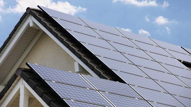 A rooftop covered in solar panels.