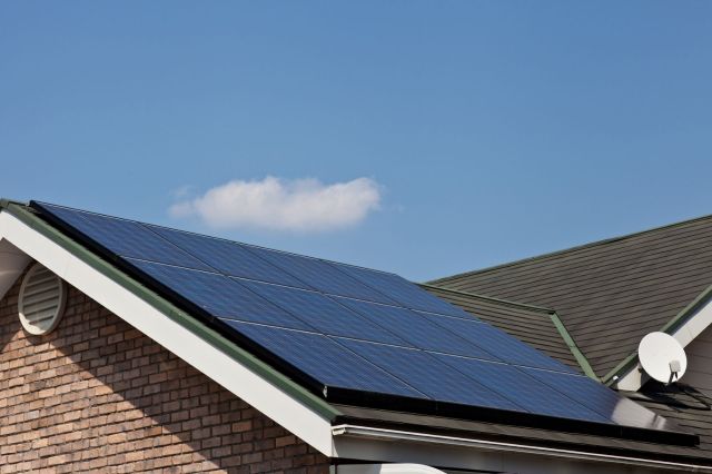 A rooftop with solar panels.