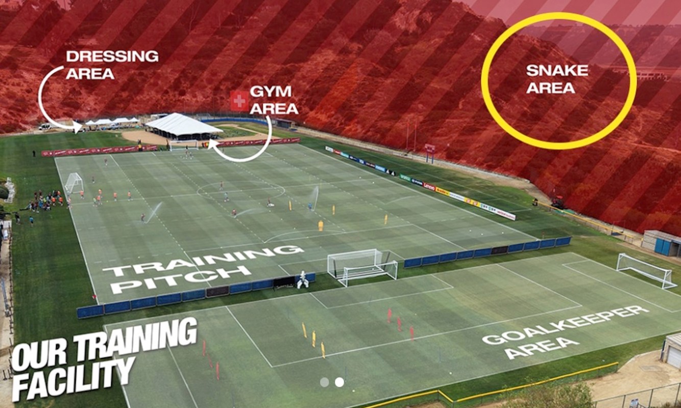 An aerial view of a soccer training facility, with the area outside it marked in red as a "snake area."