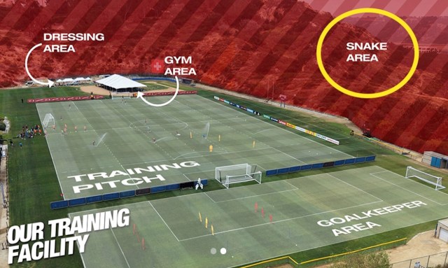 An aerial view of a soccer training facility, with the area outside it marked in red as a "snake area."
