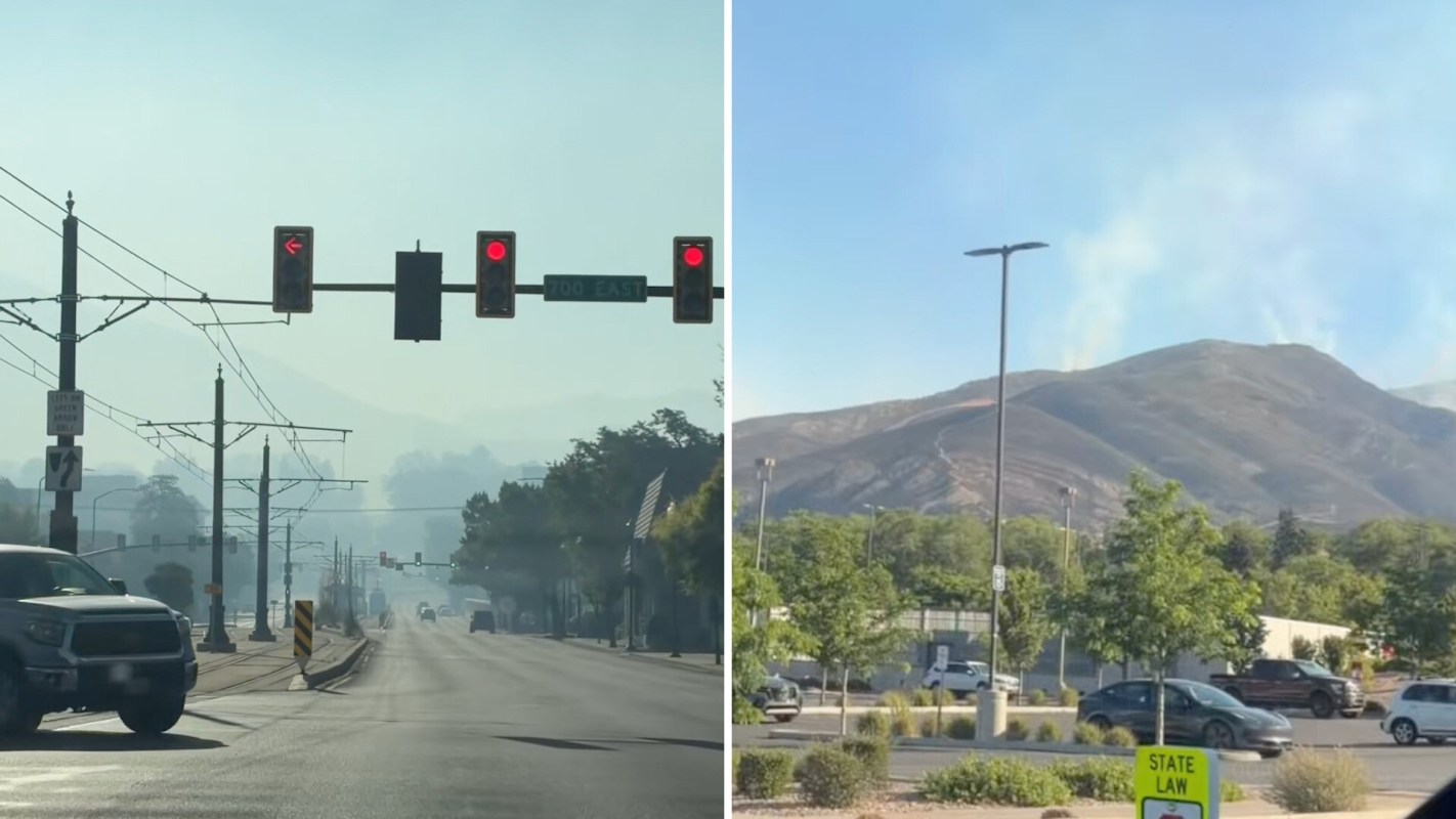 A smoky street scene with traffic lights and a distant mountain showing signs of smoke or fire.