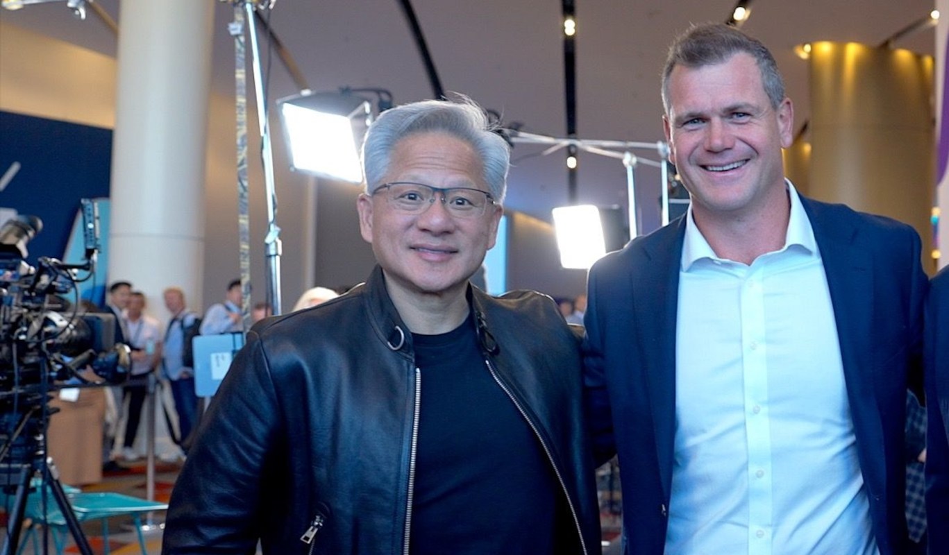 Nvidia CEO Jensen Huang and IREN co-CEO Dan Roberts pose together.