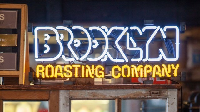 A neon Brooklyn Roasting Company sign.