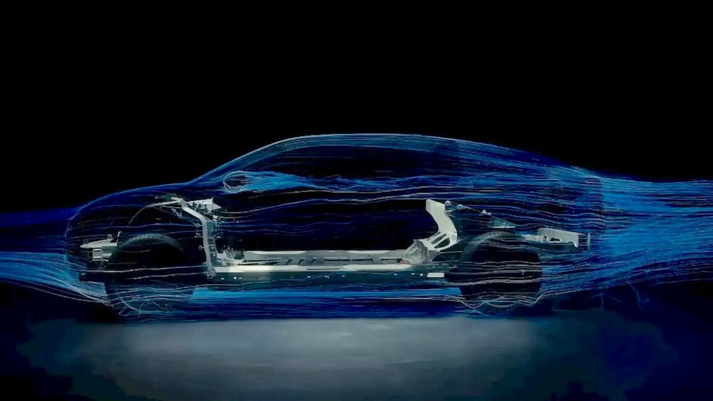 A side view of a car model with blue airflow simulation lines highlighting aerodynamic design.
