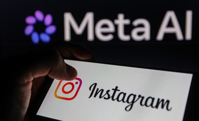 A person holding a smartphone displaying the Instagram logo with a "Meta AI" background.