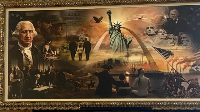 A historical mural featuring iconic American figures, symbols, and events throughout U.S. history, as well as a robot.