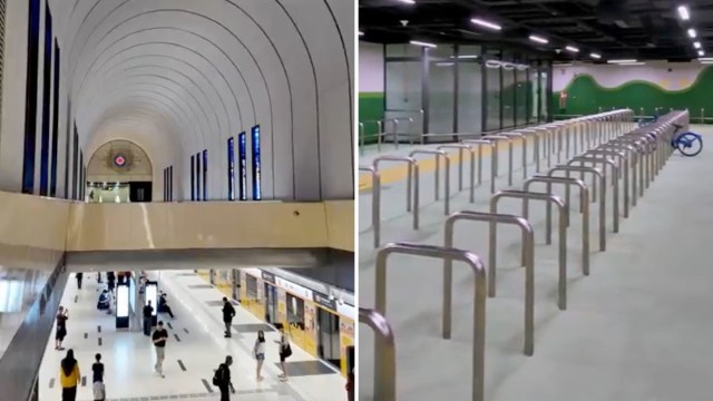 A subway station featuring curved architecture and bike parking.