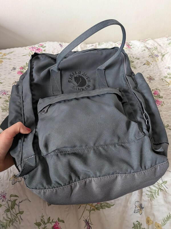 A Fjallraven Kanken backpack.