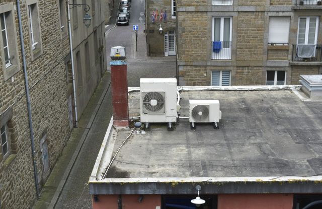 AC units on a building in France.