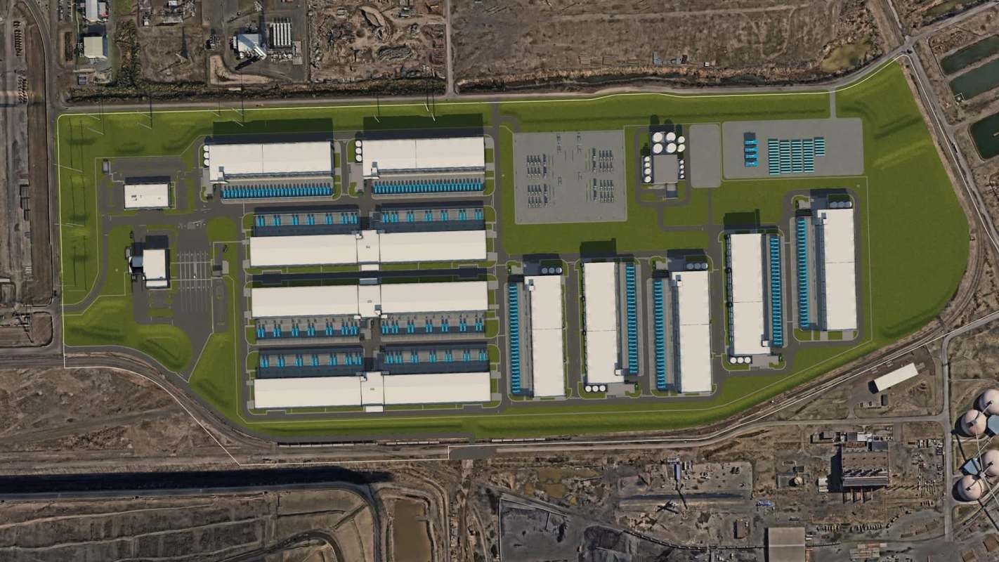 An aerial view of a large industrial complex with multiple buildings and parking areas.