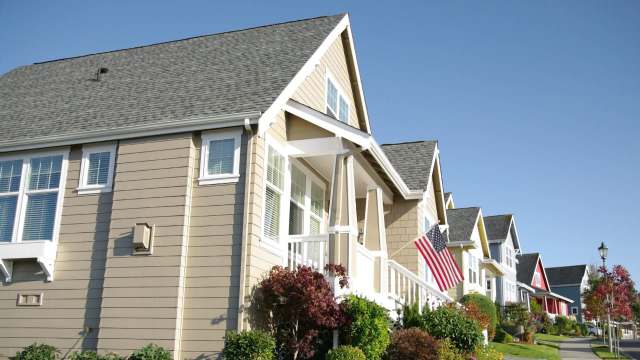 A row of houses in a suburban neighborhood.