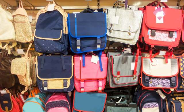 A display of backpacks in a store.