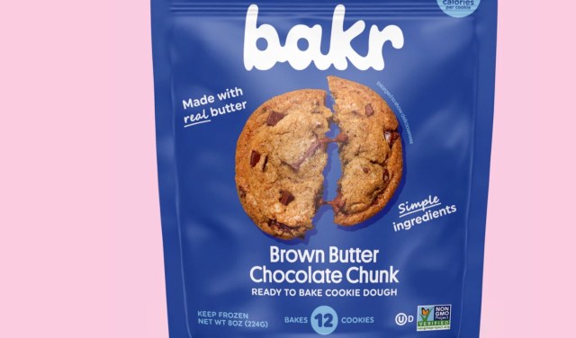 A blue packaging for bakr's Brown Butter Chocolate Chunk cookie dough with an image of a broken cookie.