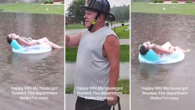 A woman relaxes on a float in a flooded neighborhood while a man in a shirt directs attention to the situation.