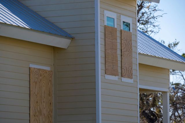 Boarded-up windows.