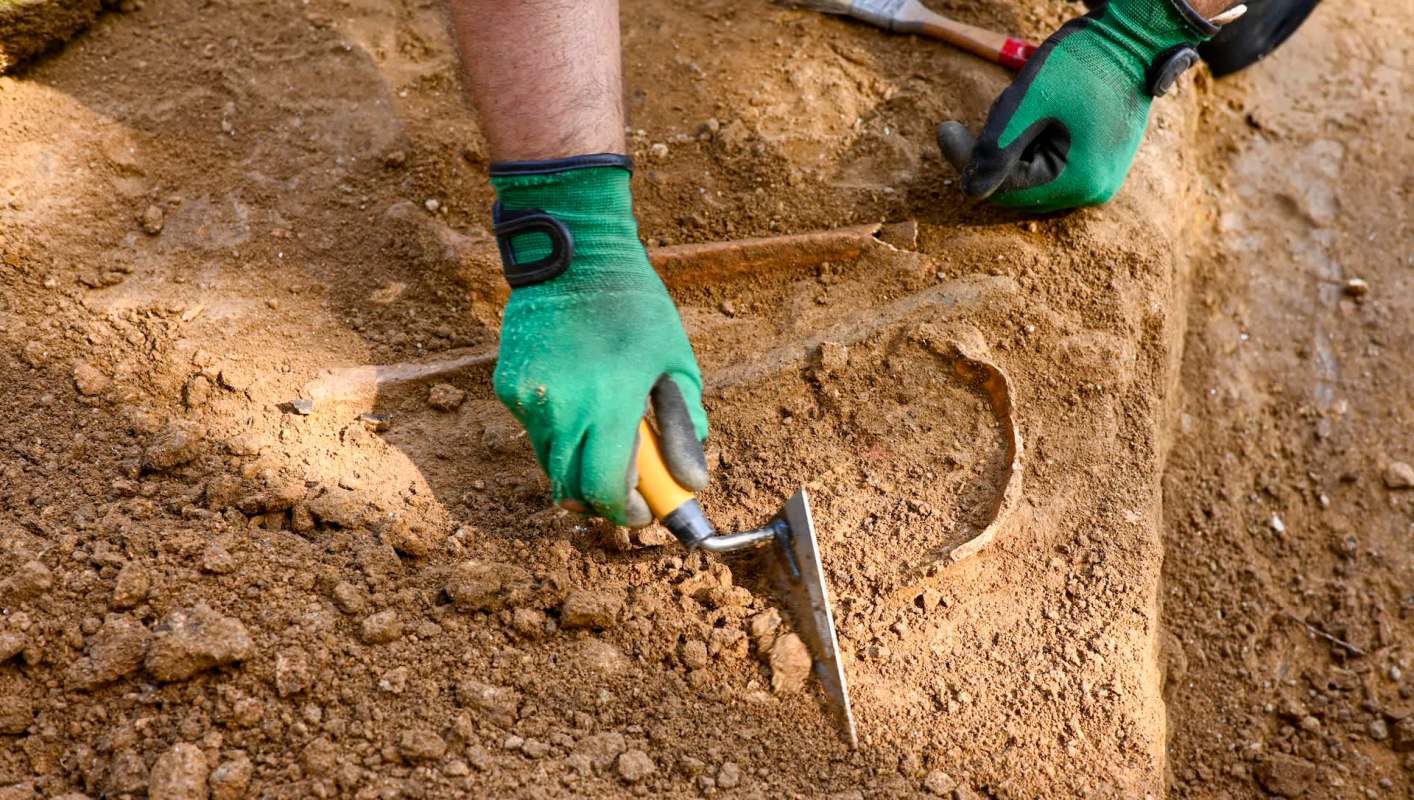 A person excavating something.