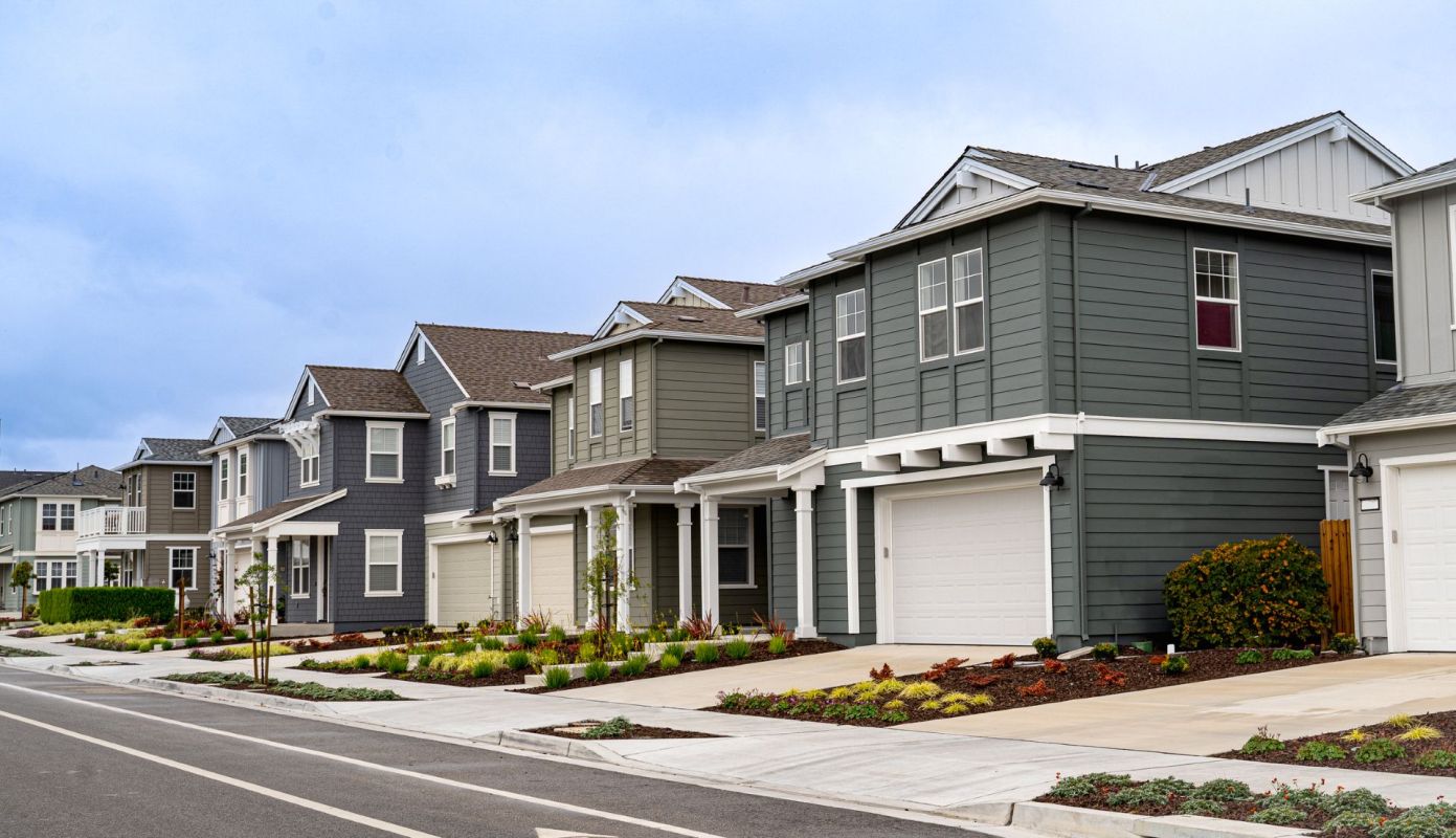 A row of single-family homes in a suburban neighborhood.