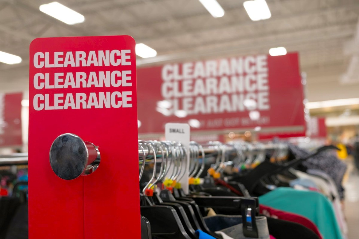 A clearance sign in a clothing store.