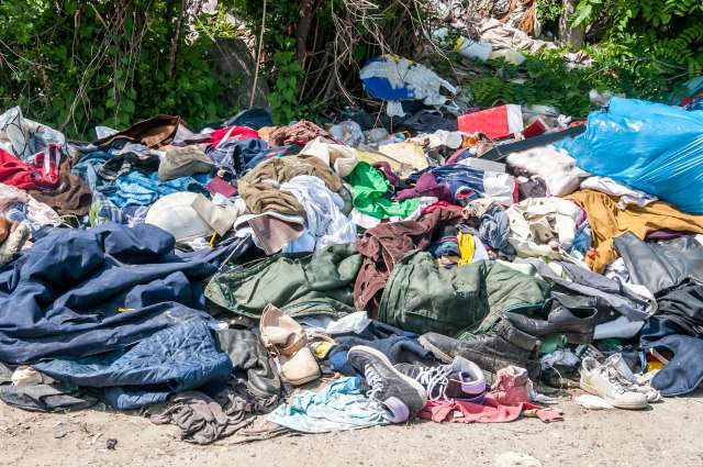 A pile of clothes at the landfill.