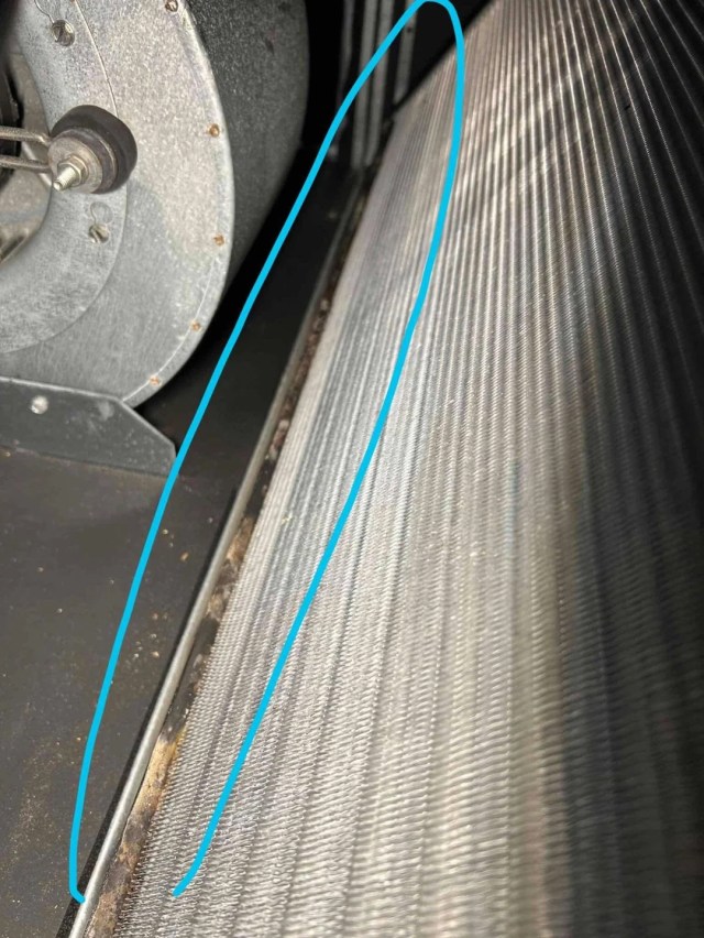 An annotated image of an air conditioning unit showing where microorganisms were supposedly found.