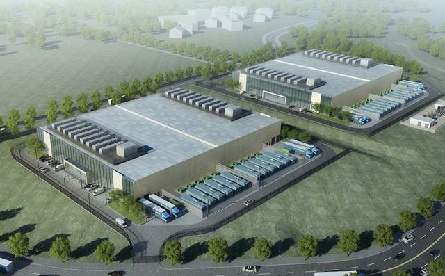 An aerial view illustration of a modern data center with two large buildings and parked delivery trucks.