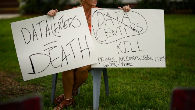 Anti-data center protest signs.