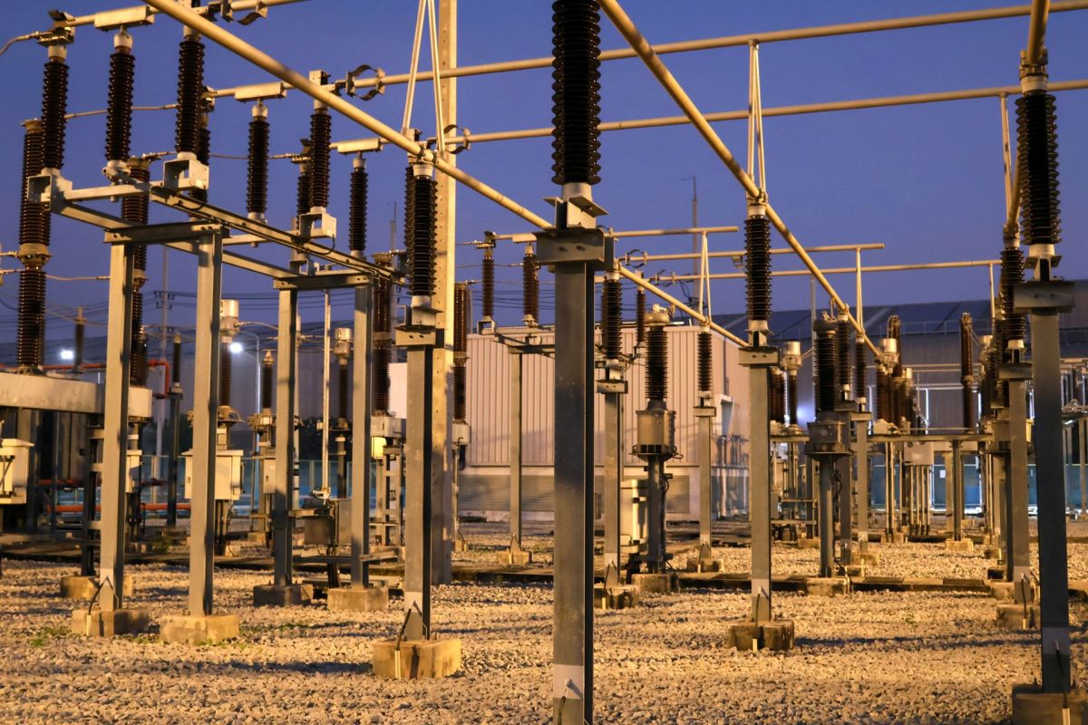 An electric substation at twilight.