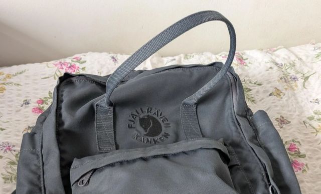 A Fjallraven Kanken backpack.