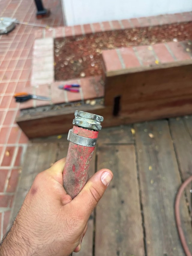 An old garden hose nozzle.