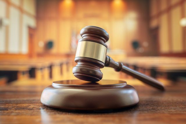 A gavel in a courtroom.