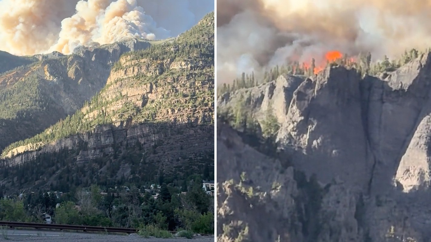 The Gold Mountain Fire burning across ridgelines and spewing thick smoke.