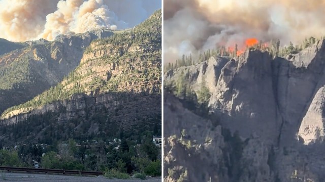 The Gold Mountain Fire burning across ridgelines and spewing thick smoke.