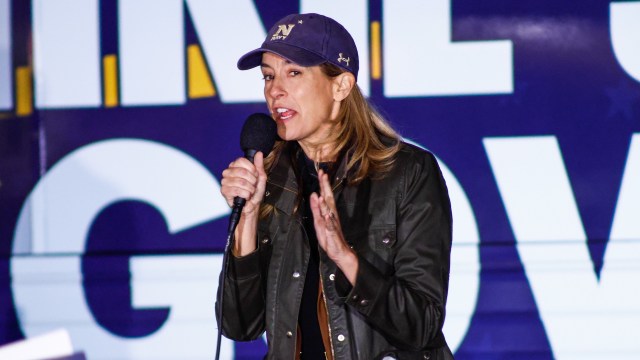 New Jersey governor Mikie Sherrill speaks into a microphone.