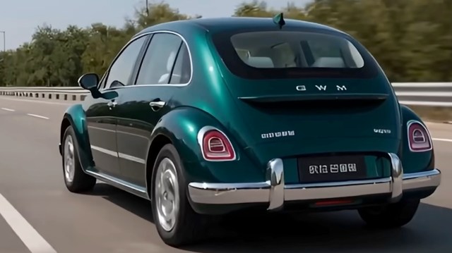 A retro-style green car that resembles a Beetle driving on a highway with trees lining the road.