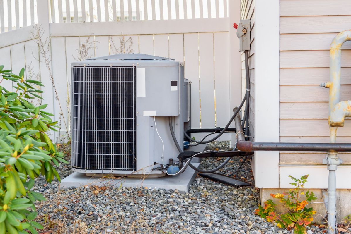 An HVAC unit outside of a house.