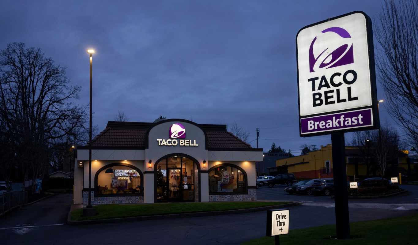 A Taco Bell restaurant at dusk.