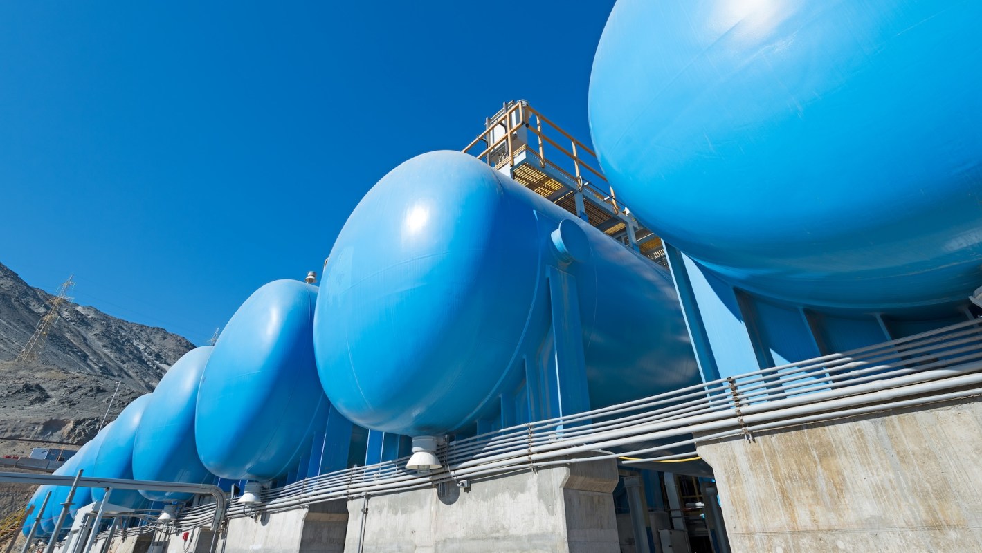 A row of reverse osmosis tanks at a desalination plant.