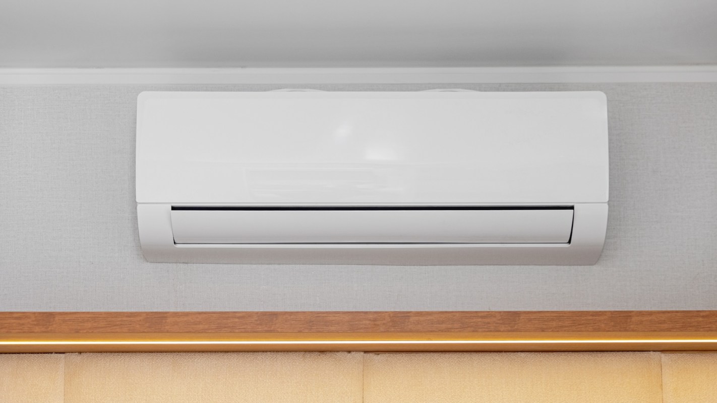 A mini split mounted on a wall.