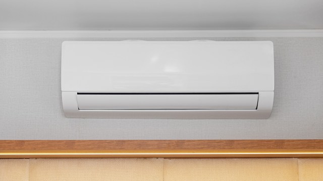 A mini split mounted on a wall.