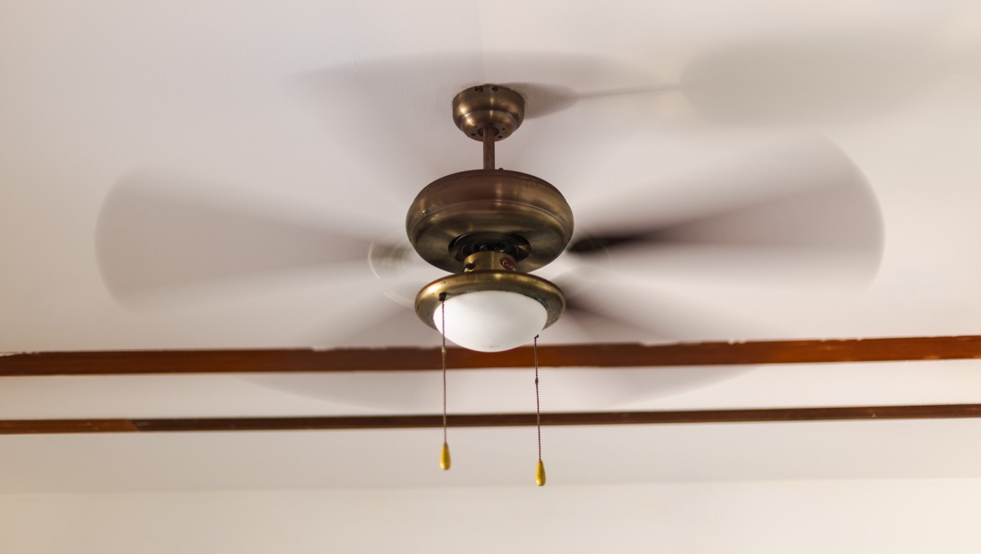 A ceiling fan circulating air.