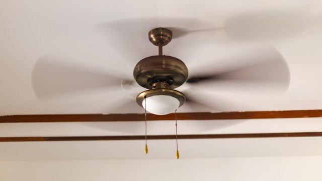 A ceiling fan circulating air.