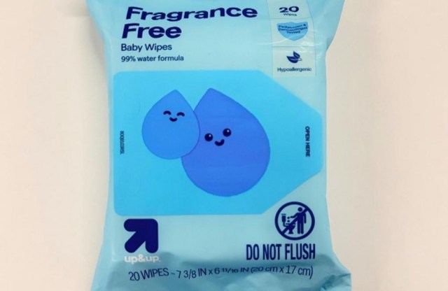 A package of fragrance-free baby wipes featuring blue water droplet illustrations and a "do not flush" warning.