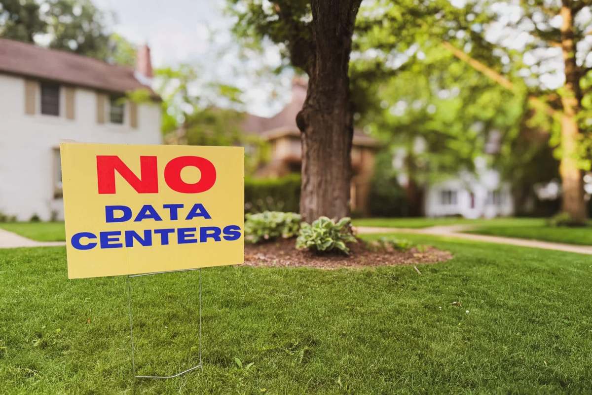 A front yard with a "no data centers" sign.