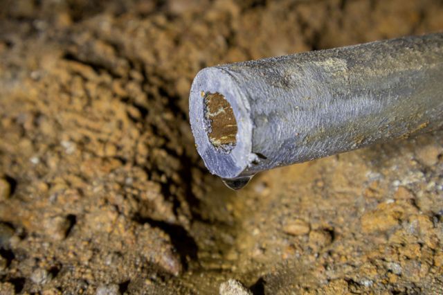 A leaking lead pipe.