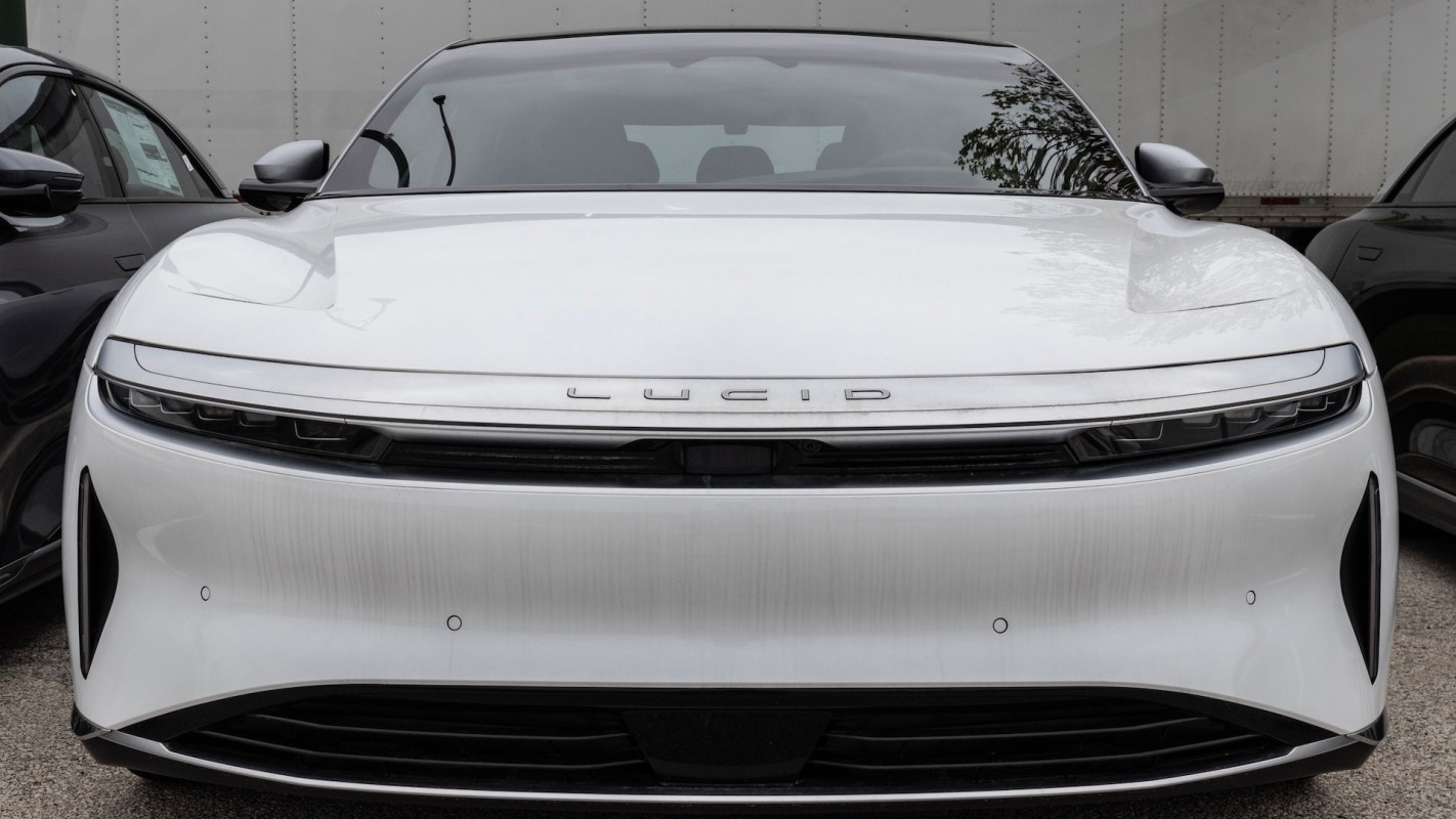 The front of a white Lucid electric vehicle.