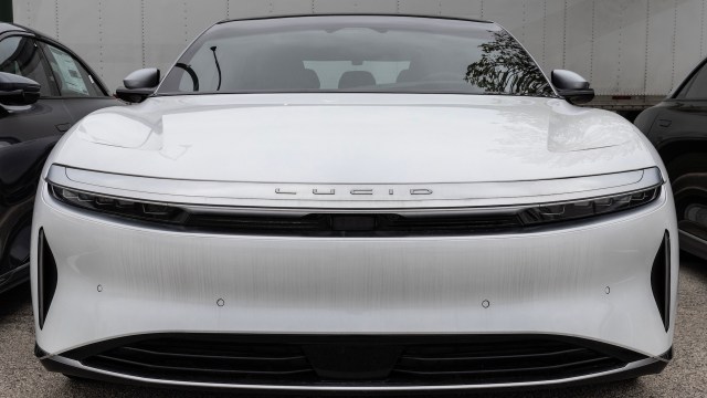 The front of a white Lucid electric vehicle.