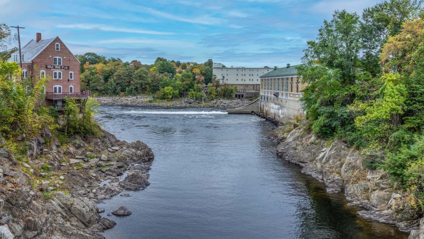 Historic brick buildings overlooking the Kennebec River.