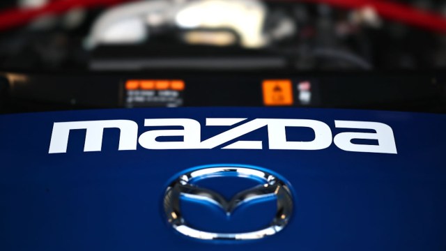 A blue Mazda engine cover.
